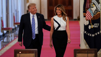 Melania Trump's Mt. Rushmore dress was not designed by child sex trafficking victims as claimed by supporters. Photo by REUTERS/Kevin Lamarque