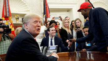 FILE PHOTO: Rapper Kanye West meets with U.S. President Trump at the White House in Washington