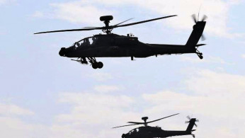 AH-64E Apache attack helicopters