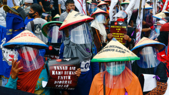 Farmers protest outside the Indonesian Parliament 