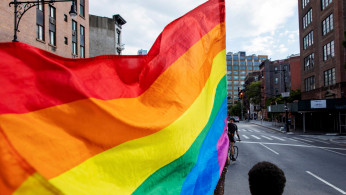 Demonstrators march in support of LGBTQ pride and black lives matter movements 