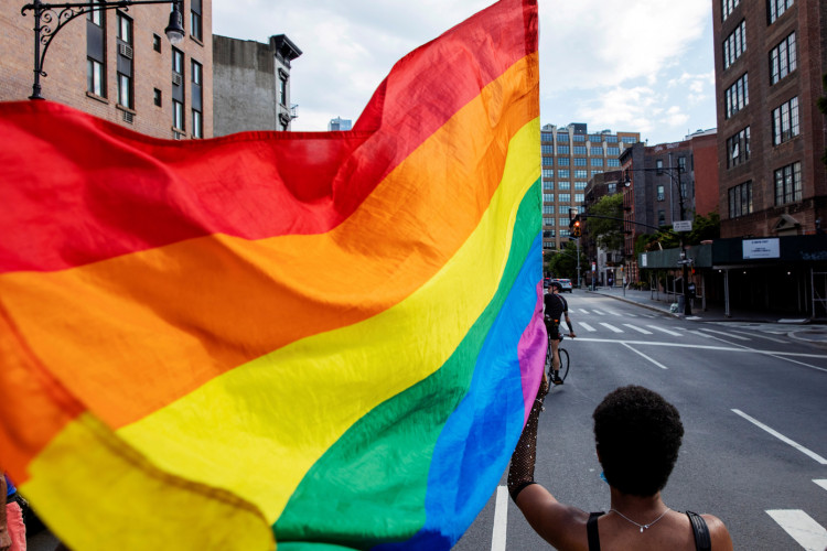 Demonstrators march in support of LGBTQ pride and black lives matter movements 
