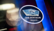 The Pentagon logo is seen behind the podium in the briefing room at the Pentagon in Arlington, Virginia