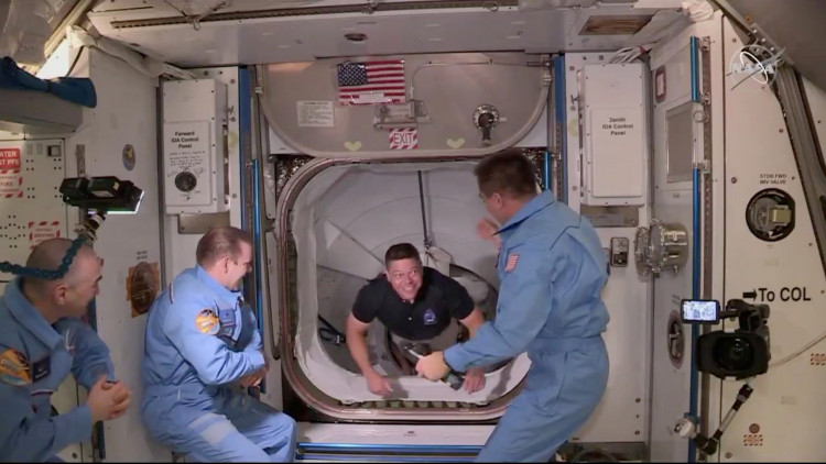 NASA astronaut Bob Behnken arrives at the International Space Station aboard SpaceX's Crew Dragon capsule in this still image taken from video May 31, 2020. 