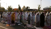 Indonesian Muslims offer Eid al-Adha prayers on the street in Jakarta, 