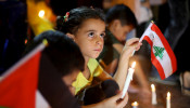 Palestinians light candles to show solidarity