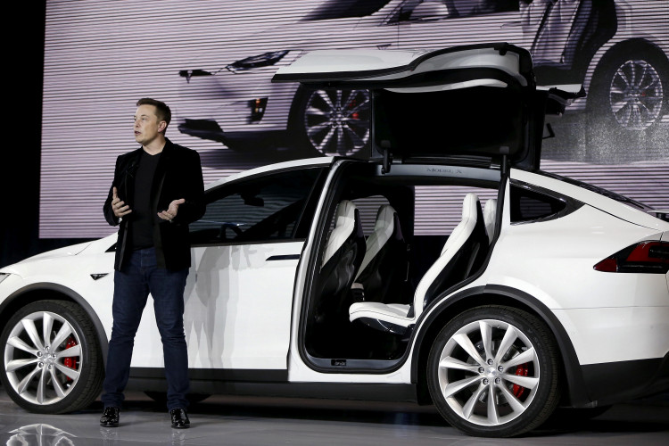 FILE PHOTO: Tesla Motors CEO Elon Musk introduces the falcon wing door on the Model X electric sports-utility vehicles during a presentation in Fremont