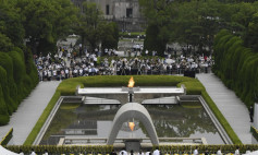 The Atomic Bomb Dome is seen from the venue holding a ceremony to mark the 75th anniversary