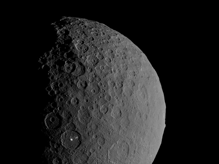 Occator Crater and Ahuna Mons appear together in this view of the dwarf planet Ceres