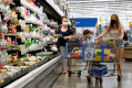 Shoppers are seen wearing masks while shopping at a Walmart store in Bradford, Pennsylvania, U.S. July 20, 2020.