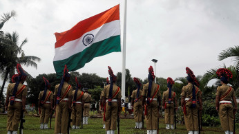 Policemen stand in a line during a flag hoisting function for Independence Day celebrations in Mumbai, India, August 15, 2020. 
