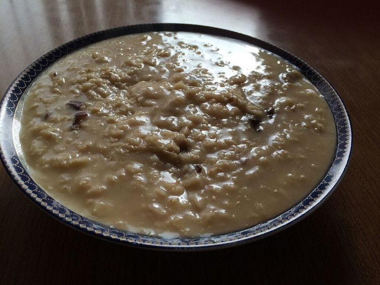 Oatmeal cooked with water to create a runny bowl of porridge