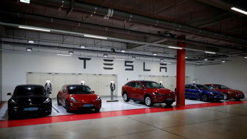 FILE PHOTO: Tesla electric vehicles for test driving are parked in Hanam