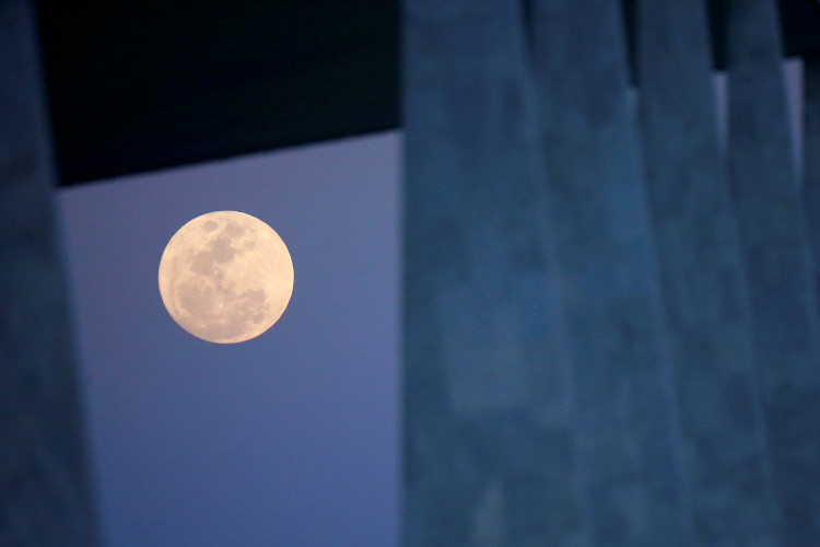 The moon is seen outside the Planalto Palace in Brasilia, Brazil, September 1, 2020.