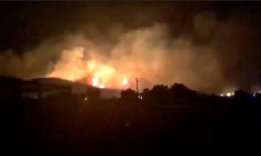 A still image from video obtained from social media of a fire burning vegatation