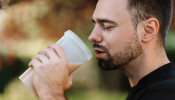 man drinking shake