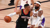 NBA: Houston Rockets guard Russell Westbrook (0) dribbles the ball against Los Angeles Lakers forward Markieff Morris (88)