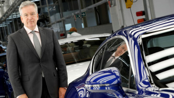 FILE PHOTO: Chairman and CEO of Bentley Motors Adrian Hallmark poses at their manufacturing facility in Crewe