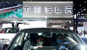 Tesla sign is seen at the third China International Import Expo (CIIE) in Shanghai