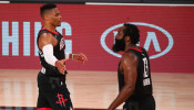 NBA: Houston Rockets guard Russell Westbrook (left) celebrates with guard James Harden (13)