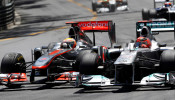 FILE PHOTO: McLaren's Hamilton overtakes Mercedes' Schumacher during the Monaco F1 Grand Prix