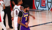 NBA: Los Angeles Lakers forward Anthony Davis (3) reacts after dunking against the Portland Trail Blazers