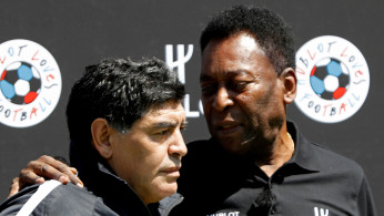 FILE PHOTO: Football legends Pele and Diego Maradona attend an advertising soccer event on the eve of the opening of the UEFA 2016 European Championship in Paris