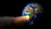 An illustration of an asteroid heading for Earth.