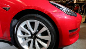 FILE PHOTO: A Tesla Model 3 electric vehicle is displayed at the Canadian International Auto Show in Toronto