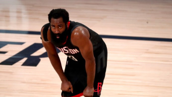 FILE PHOTO: Houston Rockets guard James Harden (13) takes a break during the second half in game four of the first round of the 2020 NBA Playoffs