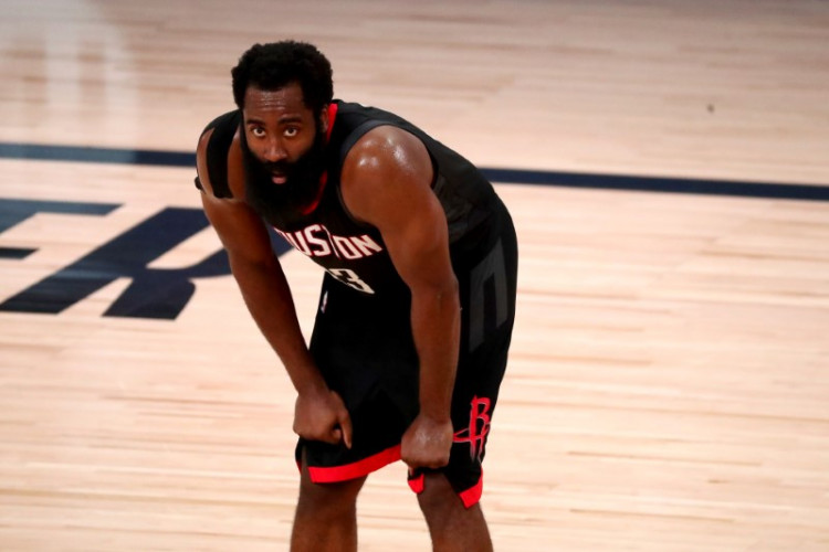 FILE PHOTO: Houston Rockets guard James Harden (13) takes a break during the second half in game four of the first round of the 2020 NBA Playoffs