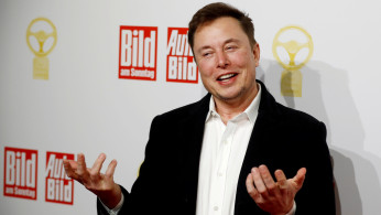 FILE PHOTO: Tesla CEO Musk at an auto awards show in Berlin in 2019