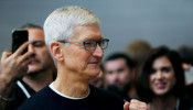 Apple CEO Tim Cook gestures during a product launch event in 2019
