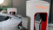 FILE PHOTO: A Tesla Supercharger station is seen in Dietikon