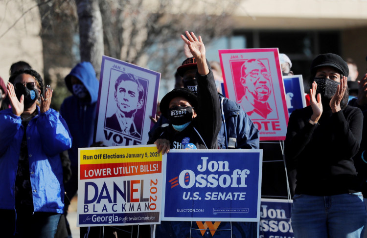 Supporters of Democratic U.S. Senate candidates Jon Ossoff and Rev. Rafael Warnock