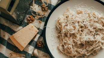 white pesto pasta with parmesan cheese