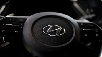 FILE PHOTO: The logo of Hyundai Motors is seen on a steering wheel on display at the company's headquarters in Seoul, South Korea, March 22, 2019