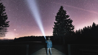 person scanning the sky