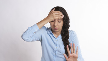 stock photo, upset woman, overwhelmed