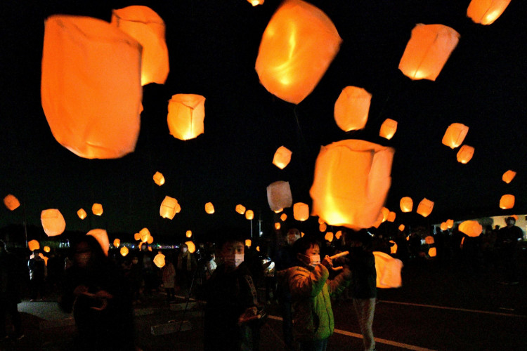 Paper lanterns are released into the night sky to mourn victims of March 11, 2011 earthquake and tsunami in Hirono, Fukushima prefecture, Japan.