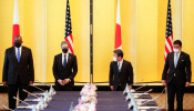 U.S. officials and Nobuo Kishi