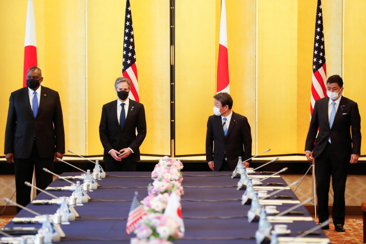 U.S. officials and Nobuo Kishi