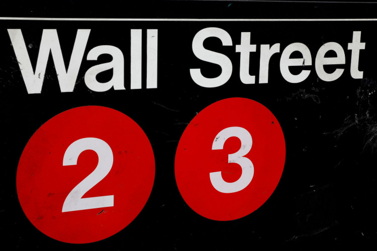 A sign for the Wall Street subway station is seen in the financial district in New York City.