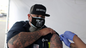 Ruben Suarez, 39, receives a Johnson & Johnson coronavirus disease (COVID-19) vaccination in Los Angeles.