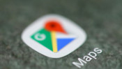 FILE PHOTO: The Google Maps app logo is seen on a smartphone in this picture illustration taken September 15, 2017. 