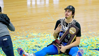 UCLA Bruins guard Jaime Jaquez Jr. (4) poses for a picture after the UCLA Bruins beat the Michigan Wolverines.