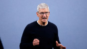 FILE PHOTO: CEO Tim Cook speaks at an Apple event at the company's headquarters in Cupertino, California, U.S. September 10, 2019. 