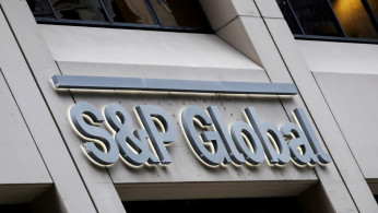 The S&P Global logo is displayed on its offices in the financial district in New York City.