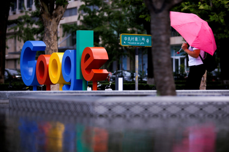 FILE PHOTO: The brand logo of Alphabet Inc's Google is seen outside its office in Beijing, China, August 8, 2018. 