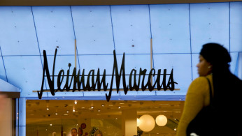 hoppers enter and exit the Neiman Marcus at the King of Prussia Mall, United States' largest retail shopping space.